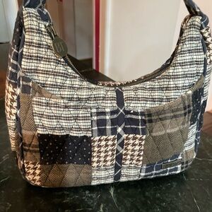 Bella Taylor Blakely patchwork hobo shoulder bag in a black, khaki, and brown